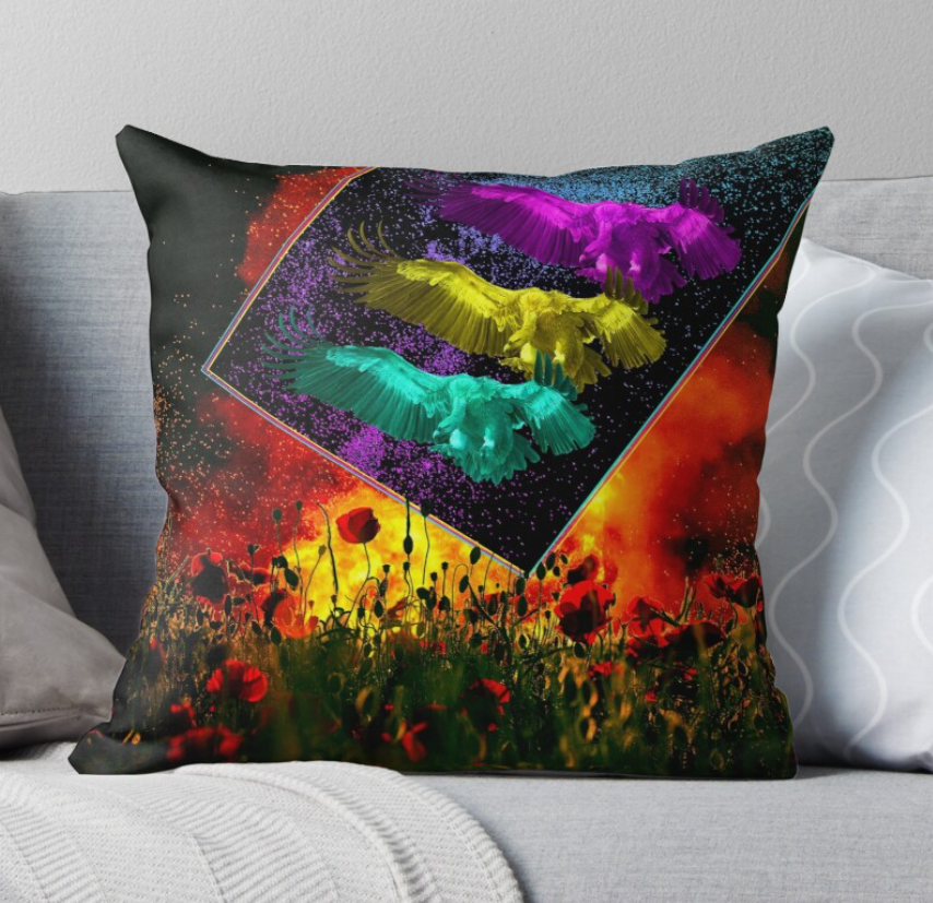 A pillow with a design of a poppy field on fire with three vultures phasing down from space a beam of neon colors.